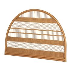 a brown wicker shelf with an arched top