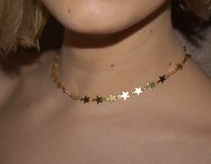 Simple & sweet star choker. One size fits all. About 12.5in-16in adjustable. If you are concerned with the size feel free to leave your measurements when you check out. Necklace is made of gold plated copper. Water, lotion, fragrances, sweat (any kind of moisture) can cause discoloration. Shipped with minimal packaging to avoid unnecessary waste. ♥️🌎 Check out our hanging stars choker here: https://etsy.me/2HiGzhi Check out our star gemstone here: https://etsy.me/31pUk68 Check out out our s Adjustable Dainty Star Jewelry, Trendy Star Charm Choker, Trendy Star Embellished Jewelry For Gifts, Cute Gold Choker Jewelry, Trendy Star Embellished Jewelry Gift, Trendy Star-embellished Jewelry Gift, Trendy Adjustable Star-shaped Necklace, Cute Adjustable Jewelry With Star Charm, Trendy Adjustable Star Necklaces