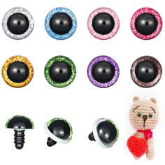 an assortment of different types of fake eyeballs with sequins and bows on them