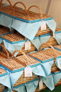 several wicker baskets stacked on top of each other with price tags attached to them