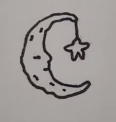 a drawing of a crescent moon with a star on it