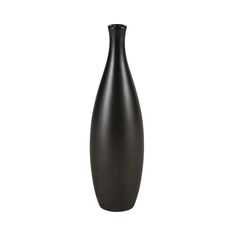 a black vase sitting on top of a white surface