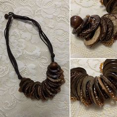 Lovely handmade bohemian wooden beaded necklace from Bali, Indonesia! 🥥 Gorgeous collection of round wooden discs made from coconut wood mixed with gold and bronze beaded discs. Rope/fabric chain that does up with little wooden button 🥥 Lovely condition! Message me if you need exact measurements.  Shown on size 12 model 5ft tall for reference.  Any questions please ask x  Tags- vintage retro 50s 60s 70s 80s beach casual boho indie festival summer sun holiday bohemian earthy beaded indian natur Wooden Beads Round Necklace For Beach, Adjustable Wooden Beads Necklace In Nature-inspired Style, Adjustable Artisan Natural Wood Necklace, Adjustable Brown Beaded Round Necklace, Bohemian Brown Beaded Round Necklaces, Bohemian Brown Beaded Necklace, Adjustable Brown Beaded Necklace, Adjustable Round Brown Beaded Necklace, Adjustable Brown Round Beaded Necklace