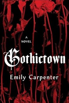 a book cover with red flowers on the front and black back ground, which reads gothtown