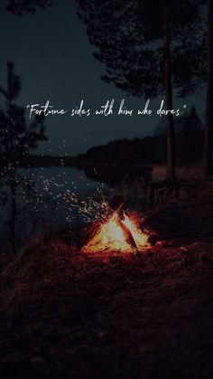 a campfire with the words fortune sits with him who dares