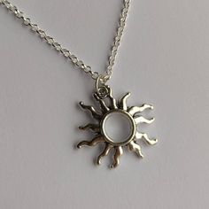 Sun pendant with your choice length silver plated necklace ● complete in gift bag  ● pendant size: 25x26mm Please select necklace length from drop down menu Necklace Sun, Necklace Aesthetic Silver, Sun Pendant, Sun Necklace Men, Sun Necklace, Metal Sun Design Necklace As Gift, Sun Pendant For Men, Sun Necklace Silver, Silver Sun Necklace