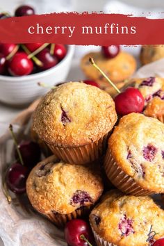 some cherries and muffins are on a plate