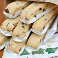 a box filled with lots of cookies on top of a table