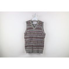 Vintage 60s 70s Rockabilly Mens Large Wool Blend Fair Isle Knit Sweater Vest USA Mens Sweater USA made. Has pilling Mens size Large Measurements are: 20 inches underarm to underarm 26.5 inches top to bottom Multicolor 70% Wool 30% Acrylic US Shipping is FREE Canada is $15 and International is $24 Check out my other items in my store! I1645 Retro Knitted Sweater Vest For Winter, Retro Knit Sweater Vest For Winter, Vintage V-neck Sweater Vest For Winter, Casual Fair Isle Pattern Vest For Winter, Retro V-neck Winter Vest, Casual Fair Isle Vest For Winter, Retro Winter Sweater Vest, Casual Fair Isle Pattern Sweater Vest For Winter, Fitted Multicolor Sweater Vest For Winter