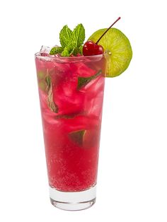 a tall glass filled with red liquid and garnished with green leaves, cherries, and a lime