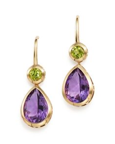 Peridot bezels and amethyst teardrops lend bold color to this drop design in 14K yellow gold. Amethyst And Peridot, Rings Ladies, Rings Beads, Metal Pendants, Peridot Jewelry, Gold And Silver Jewelry, Boho Jewellery, Gold Jewelry Earrings, Jewellery Necklace