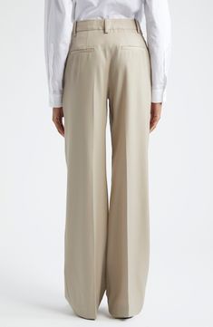 The label's signature minimalism shines through in these timeless straight-leg pants tailored from virgin wool with double pleats and puddling hems. Zip fly with hook-and-bar closure Front slant pockets; back welt pockets 100% virgin wool Dry clean or hand wash, dry flat Imported Designer Clothing This brand has B Corp certification, representing business practices with emphasis on social and environmental performance, accountability and transparency This brand meets Nordstrom Responsible Brands Elegant Wide Leg Dress Pants With Concealed Placket, Elegant Tailored Wide Leg Pants With Straight Hem, Elegant Wide Leg Pants For Office With Concealed Placket, Modern Tailored Wide Leg Pants With Pressed Crease, Elegant Wool Wide Leg Pants With Straight Hem, Elegant Beige Wide Leg Pants With Straight Hem, Beige Pants With Pressed Crease For Office, Elegant Beige Bottoms With Straight Hem, Beige Straight Hem Bottoms For Workwear