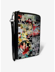 a purse with many pictures on it and a chain hanging from the front, in black leather