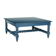 a blue coffee table with two legs and an end table that has three balls on it