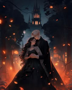 a man and woman standing in front of a castle at night