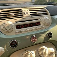 there is a radio in the dashboard of a car