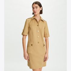 The new collection revisits signature pieces with a modern perspective. Our Camp dress is equal parts laidback and refined. Universally flattering, it has a boxy button front, epaulet shoulder details and exposed seams running from the chest to waist for tailored polish. It is the perfect piece to wear for work, weekends and everything in-between.