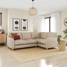 a living room with a large sectional couch