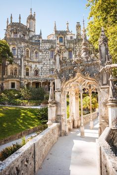 an old castle like building in the middle of a park