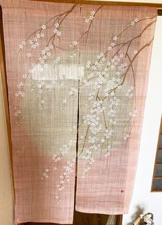 (Size)   : Approx. 88 x 150 cm / 34.64 x 59.05 inch  (Material) :  100% Linen (Condition) : Brand new Kyoto (Note) : Noren with lovely cherry blossoms shining on the fabric dyed in pale pink. The Noren is originally used for the entrance of the house for the light removal. It is also a feature of Noren that you can easily change the atmosphere of the room by hiding the back of the house from the entrance at the time of visiting,using the goods as a partition of the room and blindfold. Since the olden days, people say that Norens Curtain are a mystical barrier against evil and can remove the bad vibes from outside that cause illness and other misfortune. Sakura Room, Japanese Door Curtain, Entrance Of The House, Japanese Door, Noren Curtains, Inspired Furniture, Japanese Decor, Olden Days, Work Room