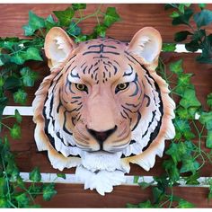 This Orange Bengal Tiger Head Wall Sculpture is 16" tall, 13.25" long and 6.25" deep approximately.  This Orange Bengal Tiger Head Wall Sculpture is made of designer composite resin, hand painted and polished. Color Tone may vary.  Looking for an exotic wall decor to grace your room? Look no further with this high quality wall plaque!!! This Bengal Tiger is the apex predator of the Asian rain forest. He is one of a kind, unmatched in power, speed and intelligence. Feel the fear and tingle run do Gift Catalog, Bust Sculpture, Apex Predator, Bengal Tiger, Tiger Head, Rain Forest, Wall Sculpture, Color Tone