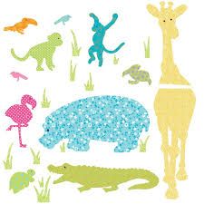 an animal and giraffe wall decal with birds, elephants, and alligators