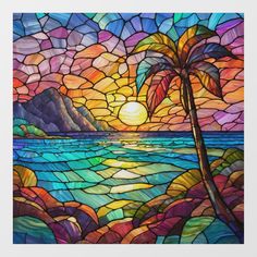 a stained glass window with the sun setting over water and palm trees in the foreground