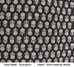 an image of a black and white fabric with arrows on it's back side