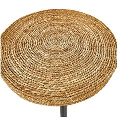 a round table made out of straw with metal legs