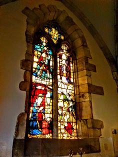 an old stained glass window in a church