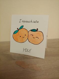 a card with two oranges on it that says i apeachunte you