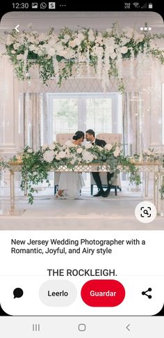 the wedding photographer is taking pictures on his phone