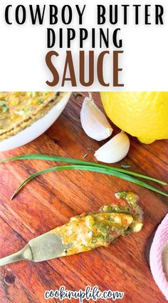 a close up of food on a wooden table with text overlay that reads cowboy butter dipping sauce