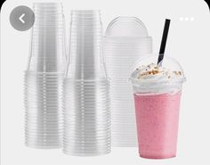 plastic cups with lids and straws are shown