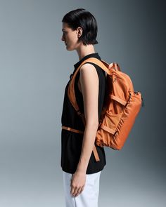 a woman with a backpack on her back