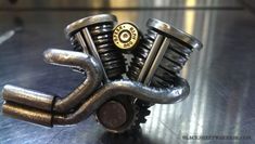 a close up of a motorcycle engine on a table