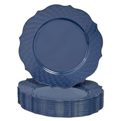 blue dinner plates stacked on top of each other in front of a white background,