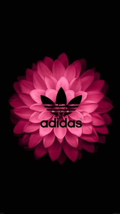 a pink flower with the adidas logo on it's center and black background