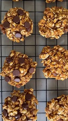 cookies with chocolate chips and oats on a cooling rack