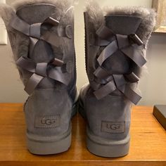 These Boots Were Only Worn A Couple Of Times! They Are In Excellent Shape:) Bow Uggs, Ugg Bailey Bow, Gray Boots, Bailey Bow Uggs, Ugg Bailey, Shoes Ugg, Bailey Bow, Grey Boots, Girly Shoes