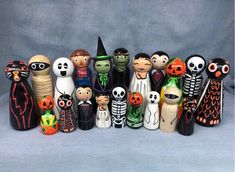 a group of halloween figurines sitting next to each other