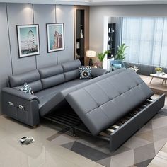 a modern living room with blue leather furniture