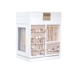 a white jewelry box filled with lots of necklaces