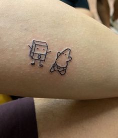 a person with a small tattoo on their arm