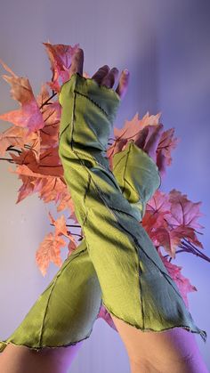 Wearable leaves! Don these leaf gauntlets to elevate your LARP, Ren Faire, or fantasy costume. Made out of a polyester/spandex stretch taffeta or 100% cotton stretch velour with embroidery details to mimic fresh leaves. Last day to order in time for Halloween: OCT 20TH NEW FALL COLORS: Sugar Maple, Pumpkin, Cauldron Approx. 15 inches long from tip to tip.  Looking for a different color? Contact me for a custom listing! Short Leaf Wristlets are also available in the shop! Extra Detailed Dewdrop G Leaf Gloves, Leaf Armor, Pumpkin Cauldron, Fall Witch, Maple Pumpkin, Halloween 20, Deep Woods, Sugar Maple, Fantasy Costumes