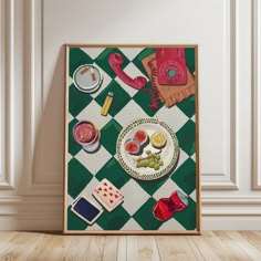 a table with food on it is displayed in front of a white and green checkered wall