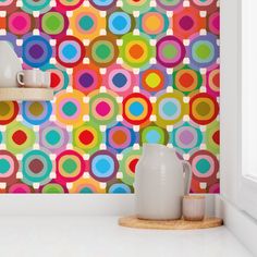 a colorful wallpaper with lots of circles on it