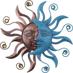 a metal sun and moon face with swirls on the sides, set against a white background