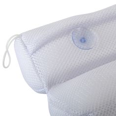 a close up of a pillow with a cord attached to the back and side of it