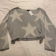 Grey Star William B Crop Sweater. New With Tags. Size M. Trendy Silver Tops For Winter, Fitted Grunge Crew Neck Crop Top, Cute Crew Neck Top With Star Print, Star Sweater Y2k, Cozy Long Sleeve Sweater With Star Print, Knit Sweater With Star Print Long Sleeve, Ruffle Sleeve Sweater, Rainbow Sweater, Cozy Knit Sweater